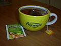 A cup of Pickwick tea in promotional mug